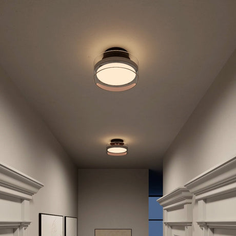 Metal and glass ceiling lamp with warm glow