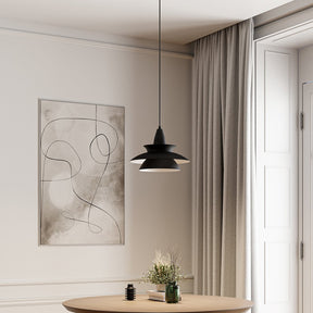 Metal pendant light with sleek modern silhouette accent