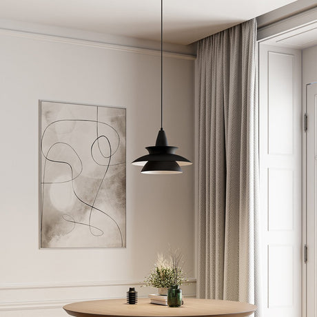 Metal pendant light with sleek modern silhouette accent