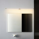 The nickel version lit above a square mirror over a basin on a pale wall