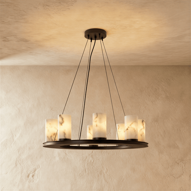 A black ring carrying eight alabaster cylinders, lit, on three cables