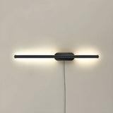 The slim black profile seen unlit, a thin bar through a small round plate