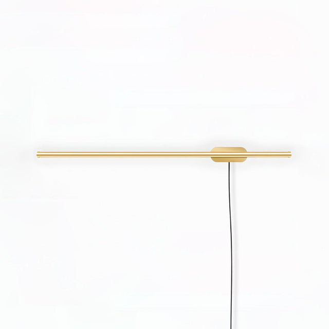 Slim gold bar crossing a round plate with a braided cord dropping down the wall
