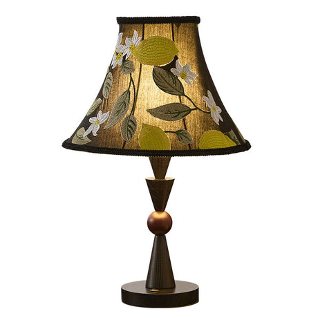 Black turned stem and brass sphere under the embroidered fabric shade