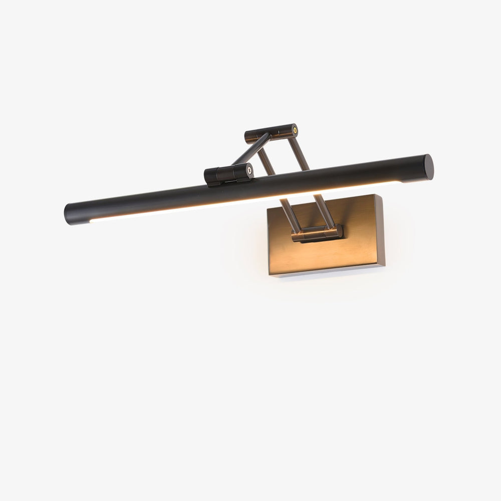 Black vanity light, a slim bar on an articulated arm rising from a brass wall plate