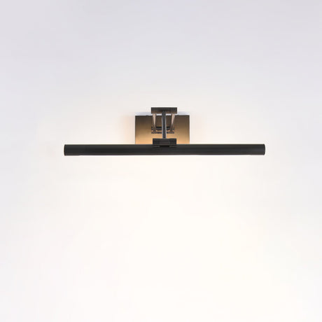 The shortest black bar lit on a pale wall, the beam spreading evenly below it