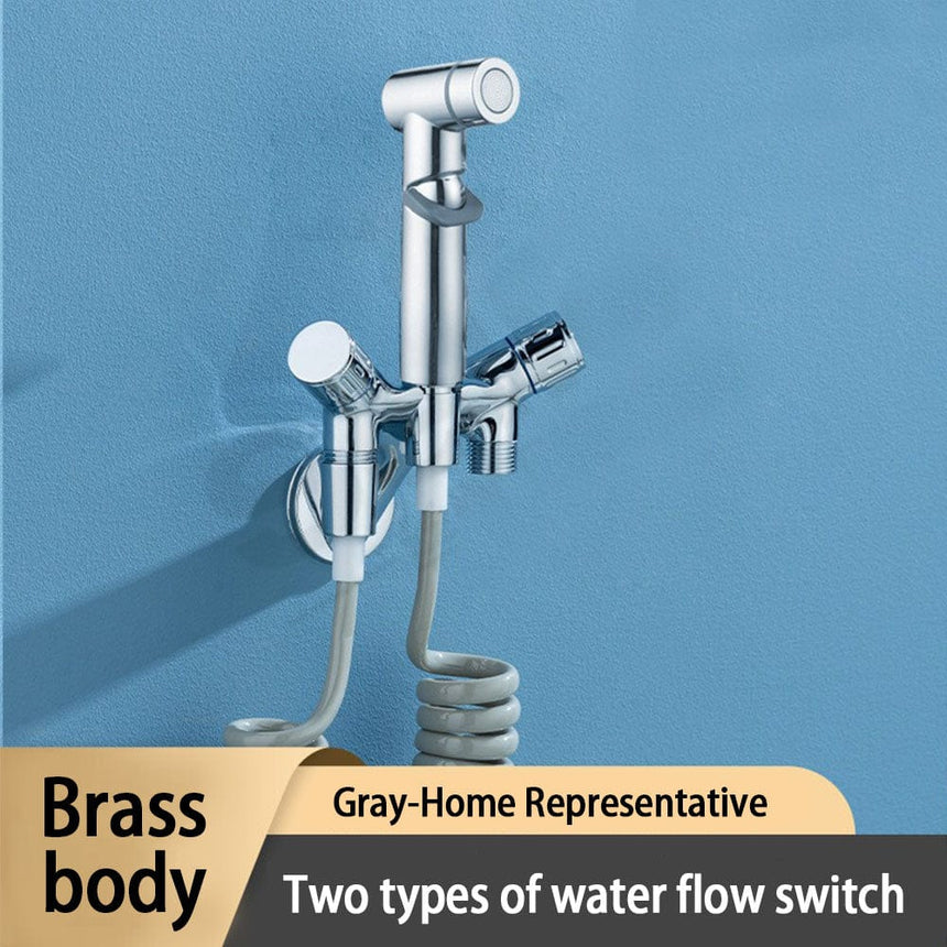 Handheld bidet spray faucet installed in a bathroom setting