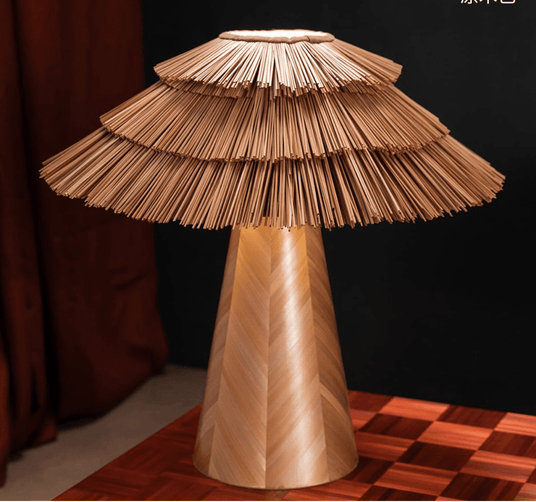 Close view of the three tiers of straw and the herringbone wood cone