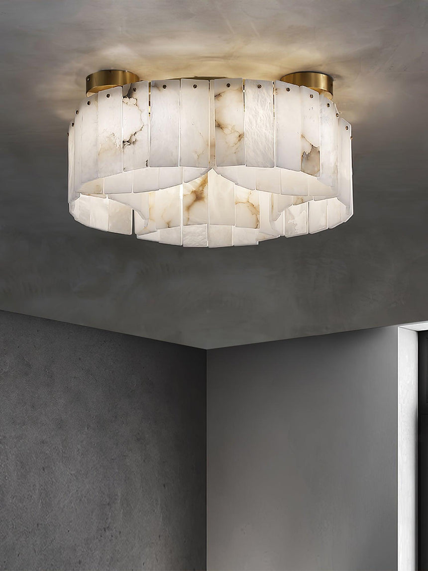 Alabaster panel ceiling light on a gray ceiling beside a wall corner