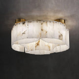 Alabaster panel ceiling light lit on a dark gray ceiling