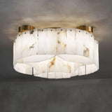 Alabaster panel ceiling light seen from below against a dark ceiling
