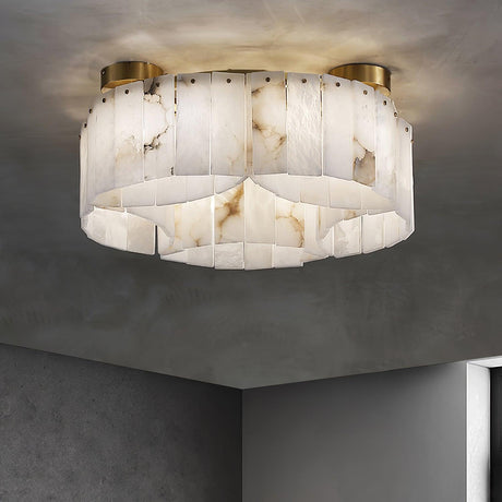 Alabaster panel ceiling light in a corner of a dark plaster room
