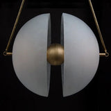 Close view of the two half discs held apart by the brass hub