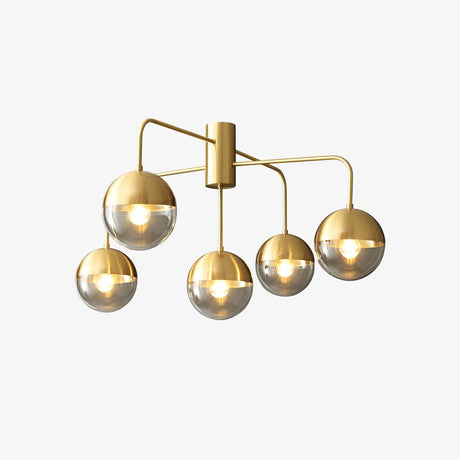 Five globe brass ceiling light seen from the side on a pale backdrop