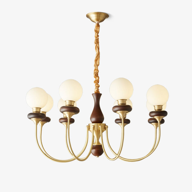 Brass globe chandelier with white glass balls on slim brass arcs