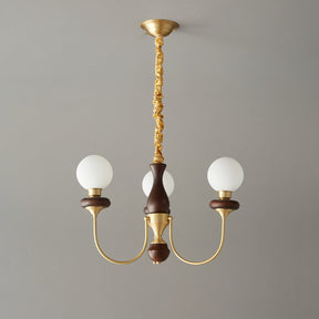 The three light build, three white glass balls on a walnut column