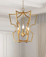 The scalloped frame lit in a pale room with a coffered ceiling and a curtain