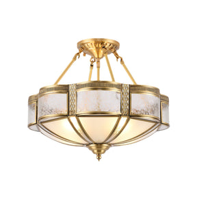 Brass semi flush mount ceiling light with milk glass panels in a cast brass frame