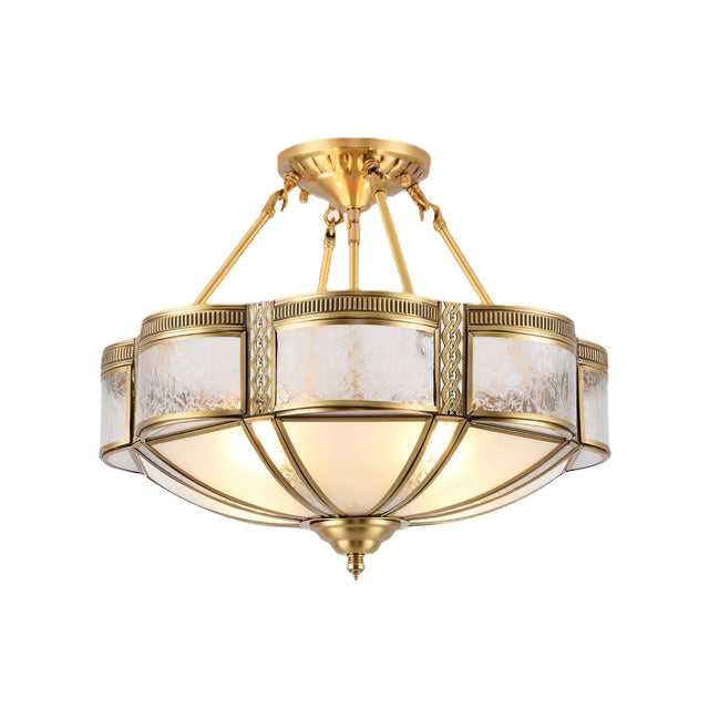Brass semi flush mount ceiling light with milk glass panels in a cast brass frame