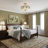 Brass and milk glass ceiling light in a bedroom with green curtains