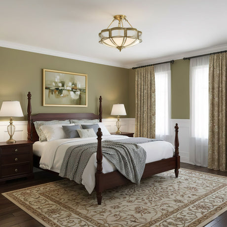 Brass and milk glass ceiling light in a bedroom with green curtains