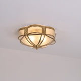 Low profile model of the brass and milk glass ceiling light on a pale backdrop