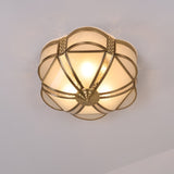 Close view of the brass cage over the underside of the shade