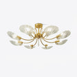 Brass semi flush mount ceiling light with fluted glass shell shades on curved arms