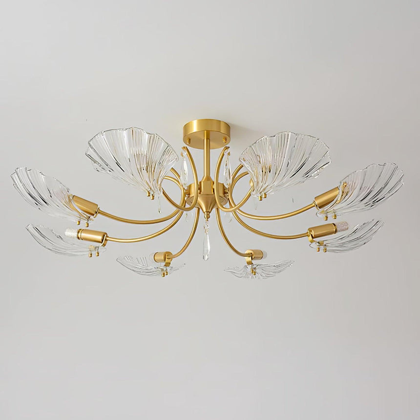 Shell shade ceiling light seen at an angle on a pale backdrop