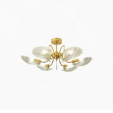 Three light version of the shell shade ceiling light on a white backdrop