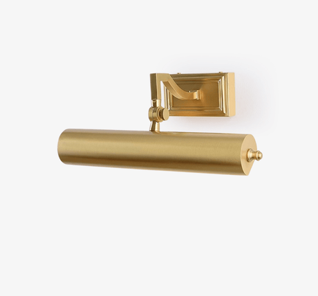 The brass tube seen at an angle, the bracket square against the plate