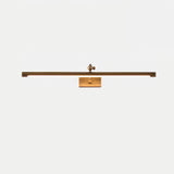 The longest bronze bar seen straight on, a narrow tube on a central pivot arm