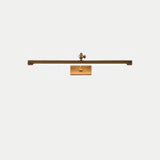 The shortest bronze bar seen straight on with the pivot arm centered above it