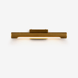 Slim bronze bar lit along its underside, a small block at its center