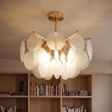The frosted version lit above open bookshelves filled with books