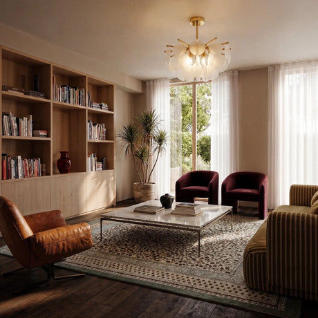 The fitting lit in a living room above a bookcase, armchairs and a patterned rug