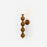 Bubble wall sconce, stacked wood beads under a white glass globe