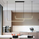 Metal pendant light with sleek modern silhouette