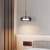 Clear glass pendant lamp shape detail close-up