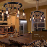 Cages lit above a live edge island counter with a window behind