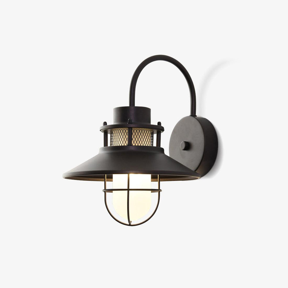 Black outdoor cage wall sconce with a gooseneck arm, wide shade and frosted glass inside a wire guard