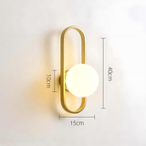 Wall lamp with frosted glass shade for living room