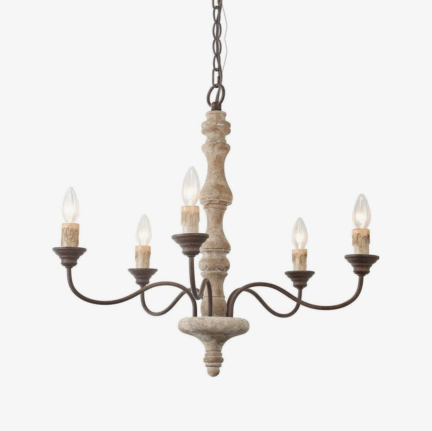 Five dark bronze arms curving out of a turned pale wood column, candle sleeves upright