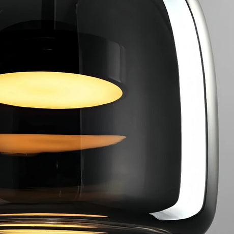 Underside of the glass shade showing the flat lit disc
