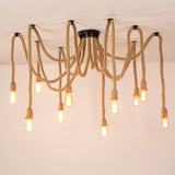 The open bulb version seen against a pale ceiling, rope arms spread wide