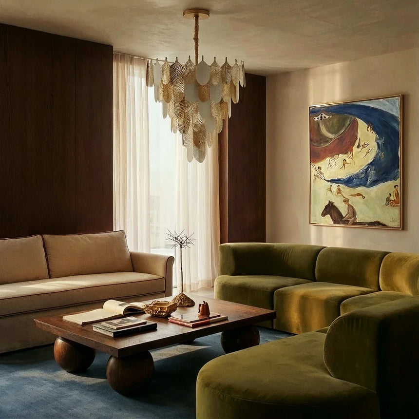 The round version lit in a living room above a green sofa and a coffee table