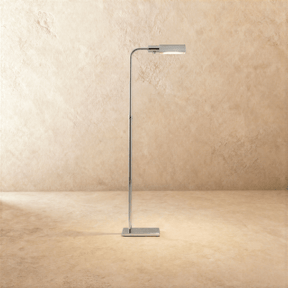 A slim polished chrome stem with a flat rectangular head tipped forward over a small base