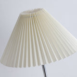 Close view of the fine vertical pleats pressed into the fabric shade