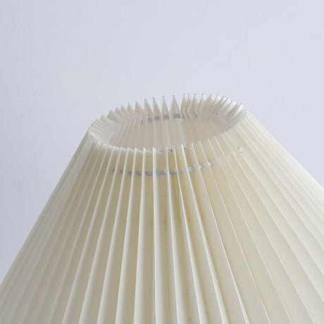 The pleated shade seen from below, the folds running to the edge