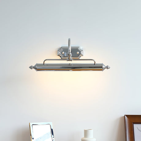 Chrome vanity light, a slim bar with turned ends on an arched arm, lit on a wall